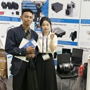 KCVENTS HVAC team with a customer at a ventilation equipment exhibition booth