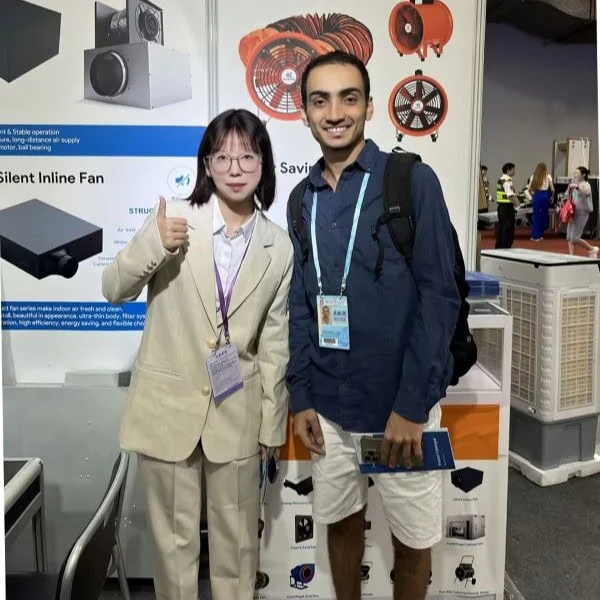 KCVENTS HVAC representative with a visitor at a ventilation product exhibition