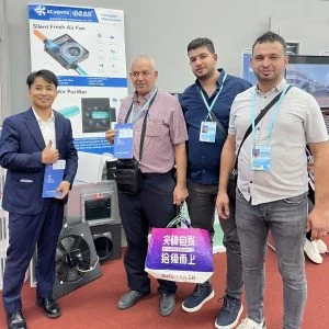 KCVENTS HVAC representative with customers at a ventilation equipment exhibition