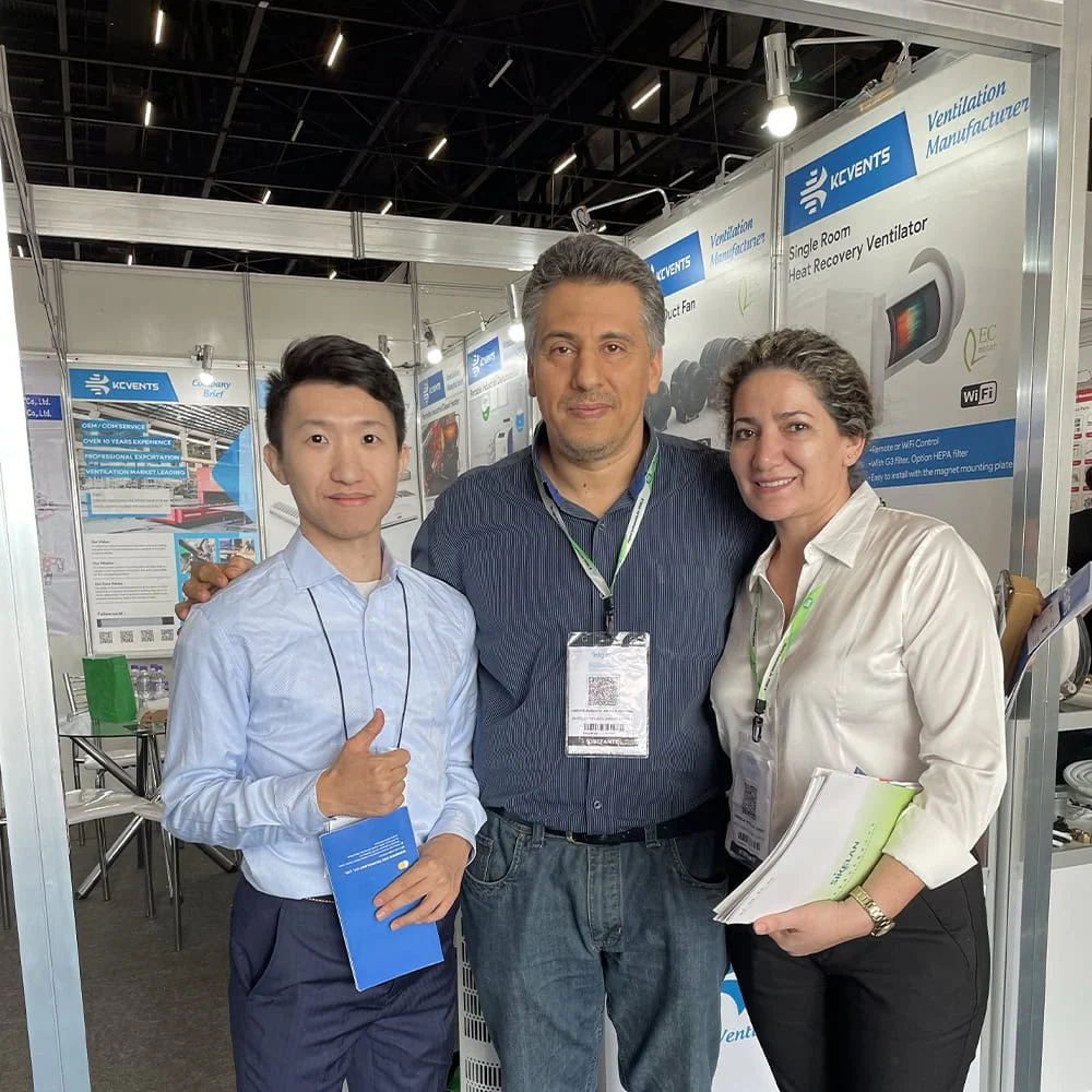 KCVENTS HVAC team with exhibition visitors and ventilation product displays